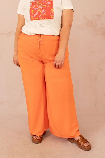 Pantalon fluide élastique à jambes larges orange - vue de face