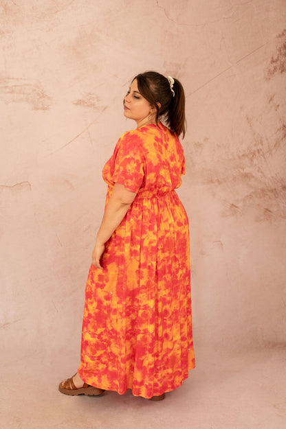 Vue arrière de la robe Ciana mettant en valeur la coupe empire
